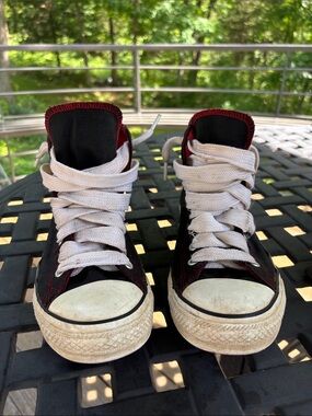 Chuck Taylor Converse Black High-Top Sneakers with White Laces and Red Trim